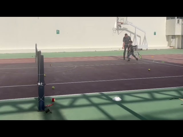 Practicing Tennis- Base Tennis academy - GAB class=