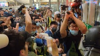 Hong Kong policeman draws pistol on protesters after being ...