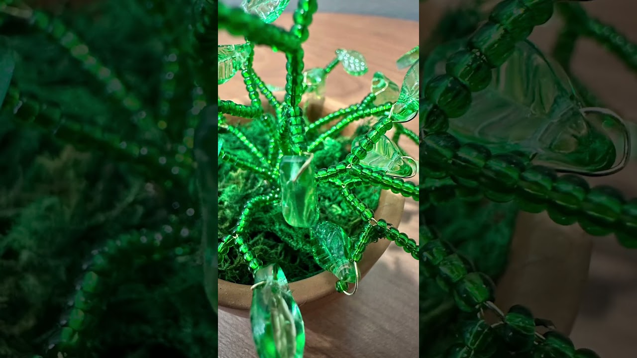 I used wire and glass beads to make a miniature beaded plant 