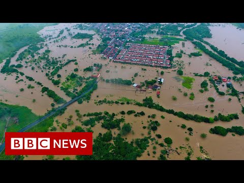 Dams burst in Brazil as deadly flooding continues - BBC News