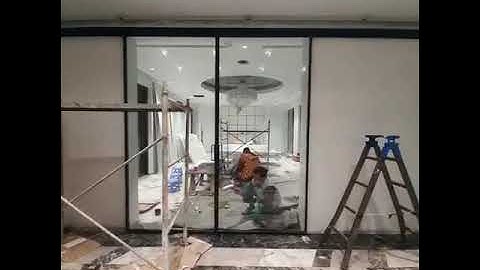 Lắp đặt cửa nhôm Slim 2 cánh lùa sang 2 bên không ray dưới của Âu Việt