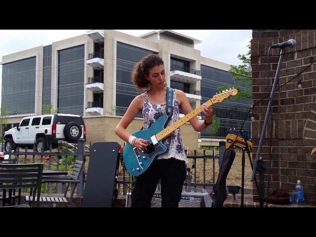 Krista Hess playing along with Klarc Whitson