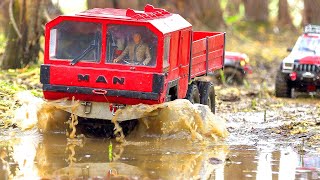 Drowned in Adventure: RC Trucks Push Limits in Muddy Wilderness!