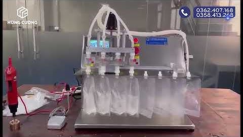 Máy chiết rót túi có nắp mở 4 vòi