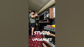 Sit stand desk in the home studio.