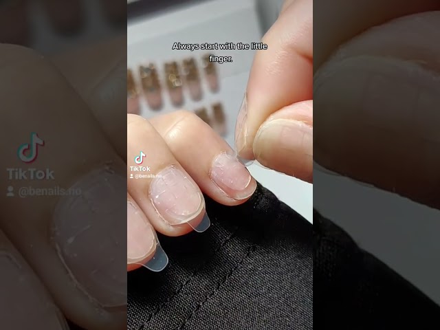 How to apply press-ons with glue tabs 🦋 #pressonnails #viral #nails #shorts class=