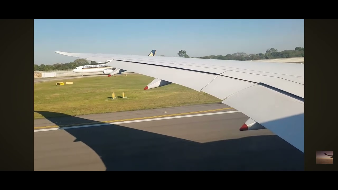 Wing view left takeoff from SIN To TPE b787 10 Dreamliner SQ 876
