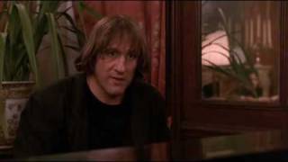 Gerard Depardieu plays piano and sings a poem in Green Card