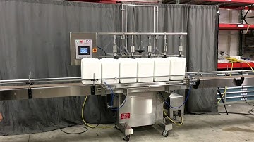 Overflow Filler Model GI3300 and special 1in Bottom Up pressure nozzles with 12in long effective