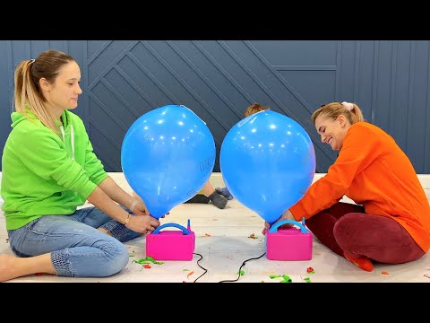 Children And Moms have Fun with Giant Balloon Blow and Pop