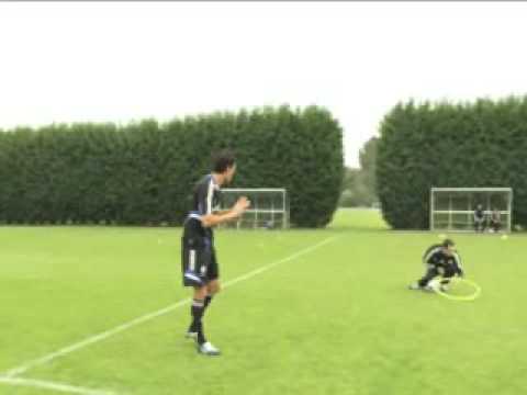 Michael Ballack practices hitting targets.