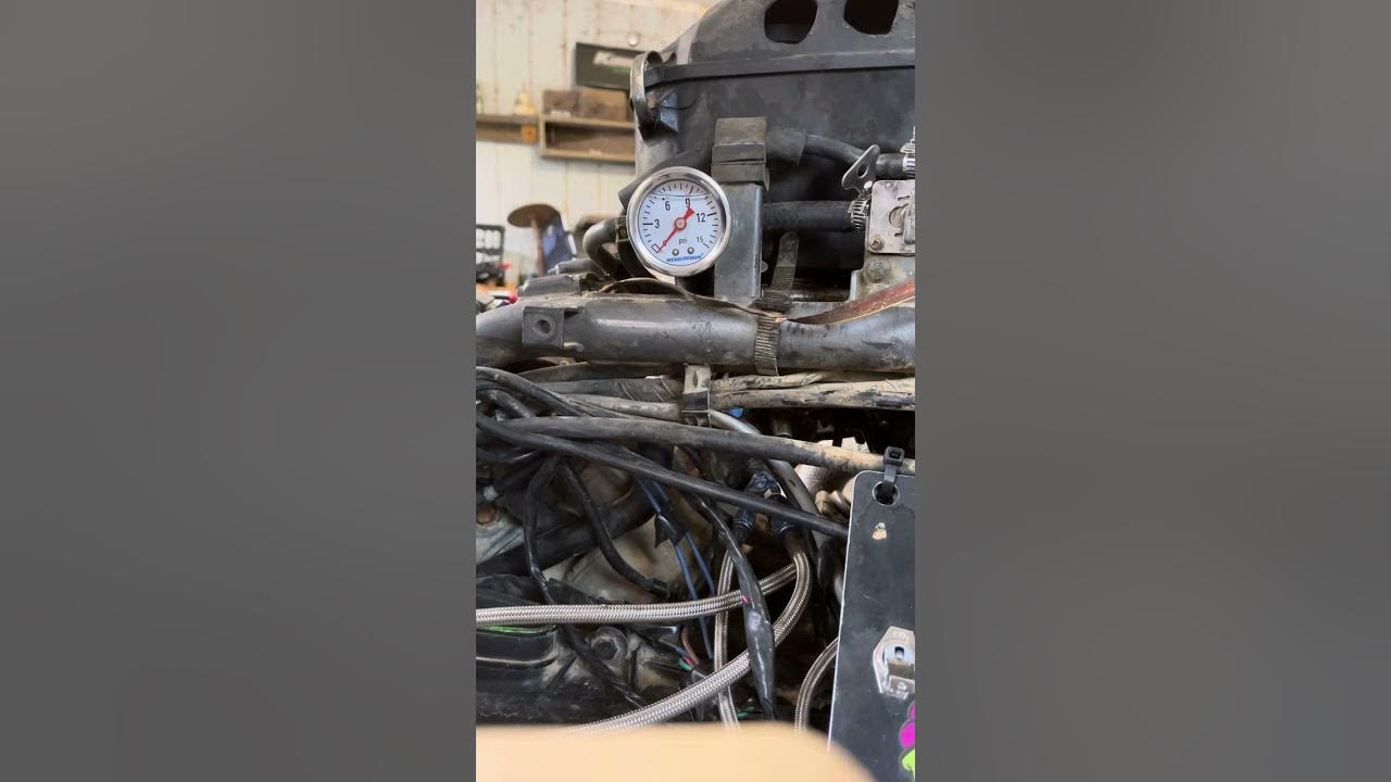 Testing fuel pressure on a kfx700 kawasaki backyardmafia racing 
