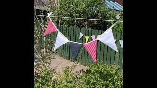 Sam making VE Day bunting