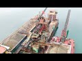 Barge mining Cobblestone and sand in the river ! The view of the river is beautiful
