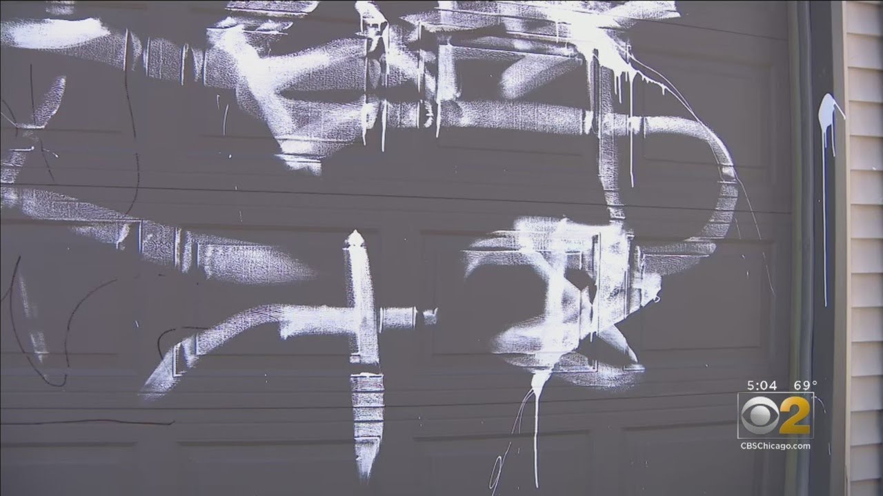 'It's Disgusting': Family In Irving Park Finds Swastika Painted On Garage