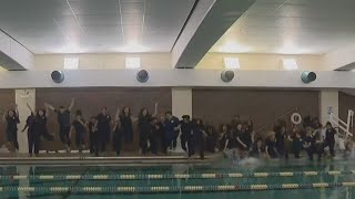 UIC College of Nursing graduates celebrate with jump in pool