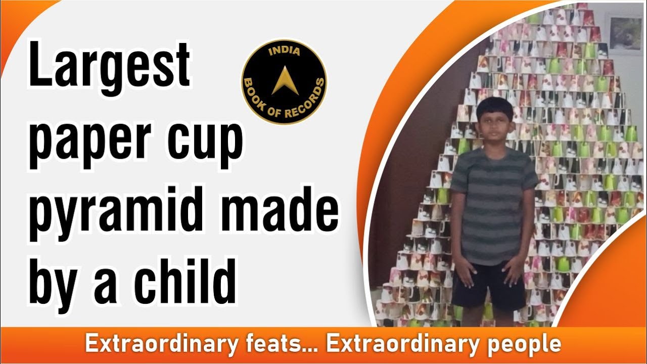 Largest paper cup pyramid made by a child - YouTube