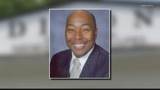 Community holds vigil for funeral director