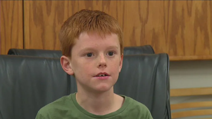 Greenfield boy donates savings to police