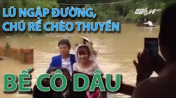 (VTC14)_Lũ ngập đường, chú rể chèo thuyền, lội nước bế cô dâu