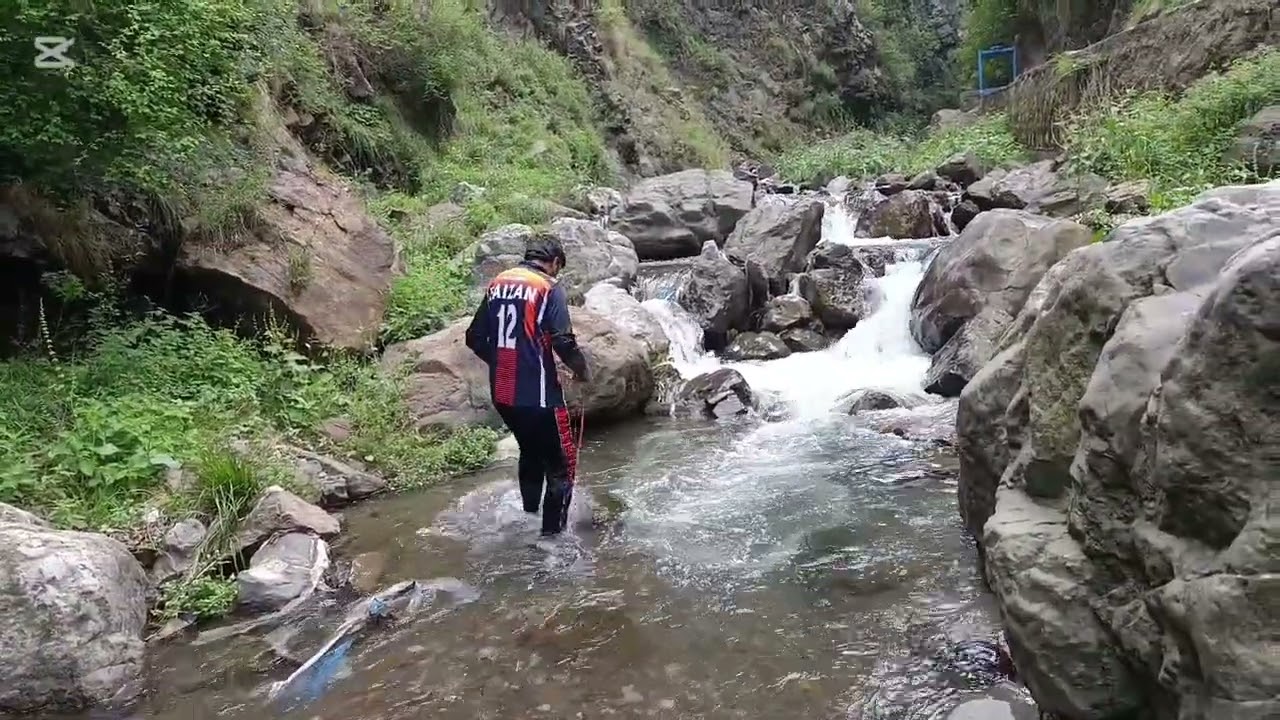 Net casting in a small stream beautiful waterfalls, where some spots are surprisinglydeep