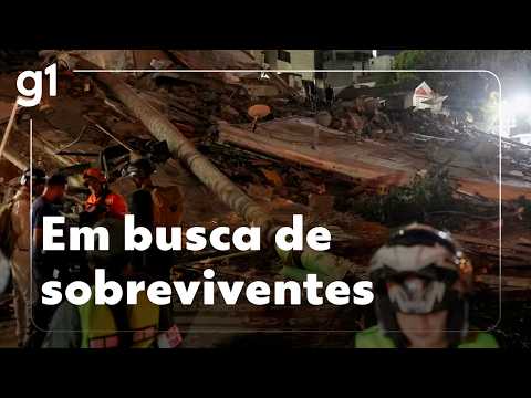 Rescue teams search for survivors in the rubble after earthquake leaves 164 dead