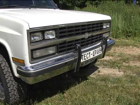 Video: Koj yuav kho lub teeb taub hau ntawm Chevy Suburban 1999 li cas?