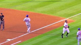 Trevor Story leaps to throw out Chris Flexen at first