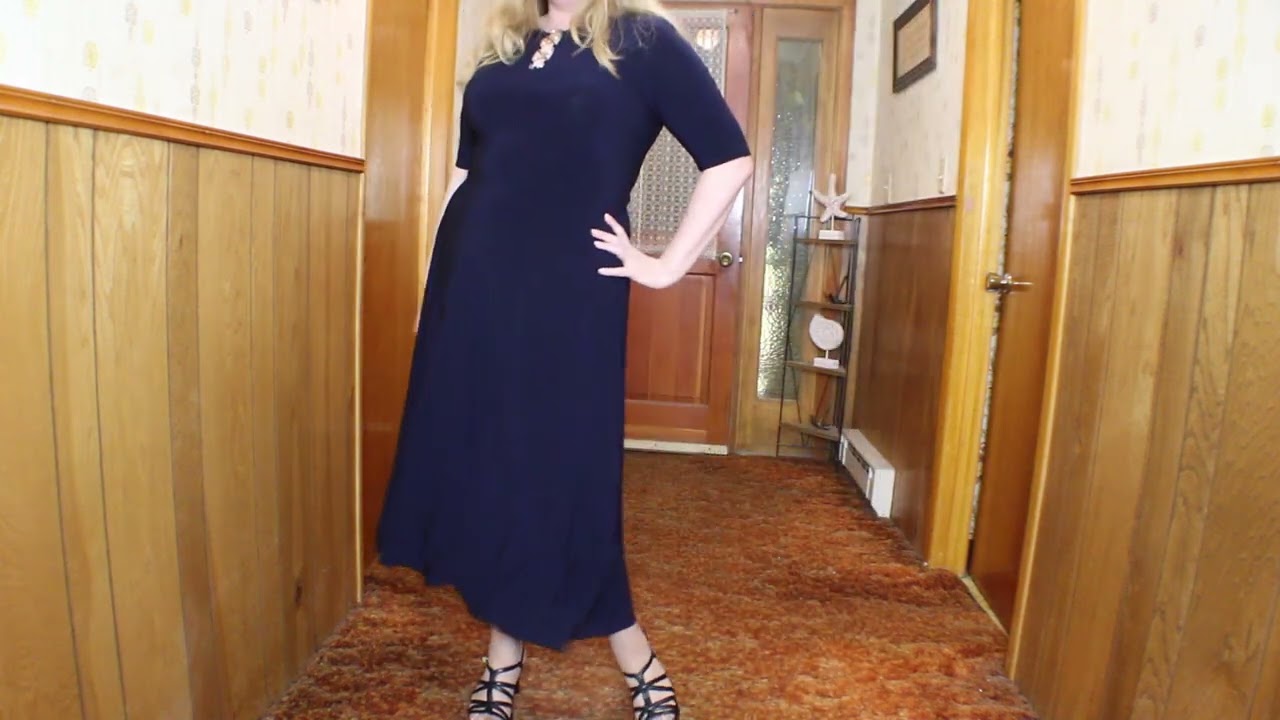 Navy blue dress complete with hosiery and heels