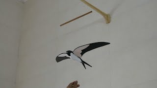 Wooden flying bird mobile