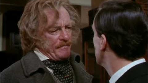 Holmes unbends a fire poker