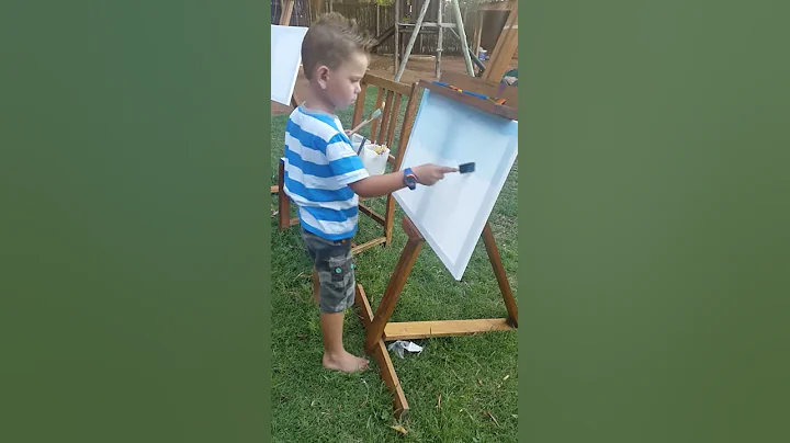 Six year old Cael painting