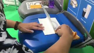 Applying a label to EcoDepo recycling bins