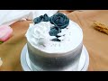 Black rose extravaganza opulent cream cake with exquisite black rose and shimmering silver pearls