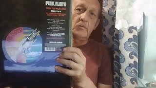 картинка: распаковка нескольких альбомов Pink Floyd