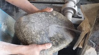 Cutting big Jade Jadeite Bolder searching for Green
