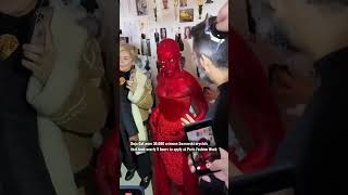 Doja Cat wearing 30,000 crimson Swarovski crystals at Paris Fashion Week