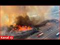 Large brush fire west of Los Angeles grows, causing partial highway closures