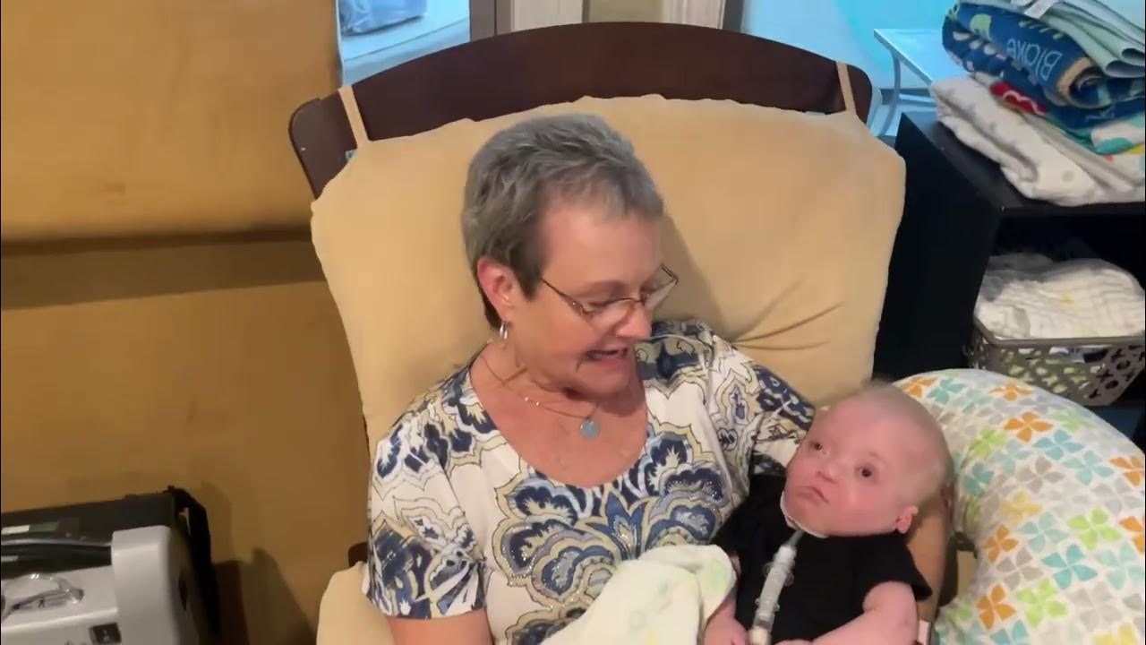 Mama Sue is with Baby Blake Mosaic Trisomy 22 awareness I'm holding