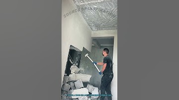 Using Soft-Handled Hammer for Wall Demolition