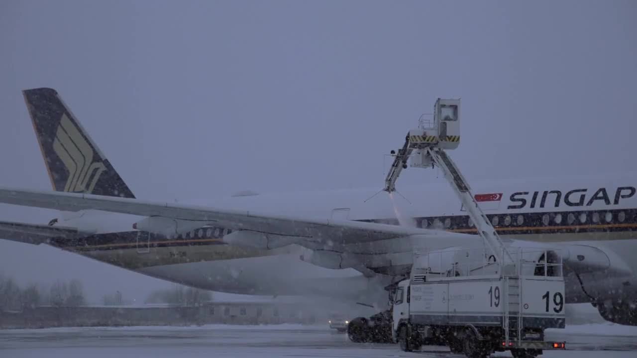 Spraying DeIcing Fluid On A Plane Stock Video YouTube