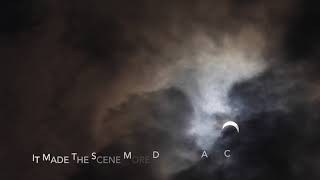 Solar Eclipse As Seen Through Rain Clouds
