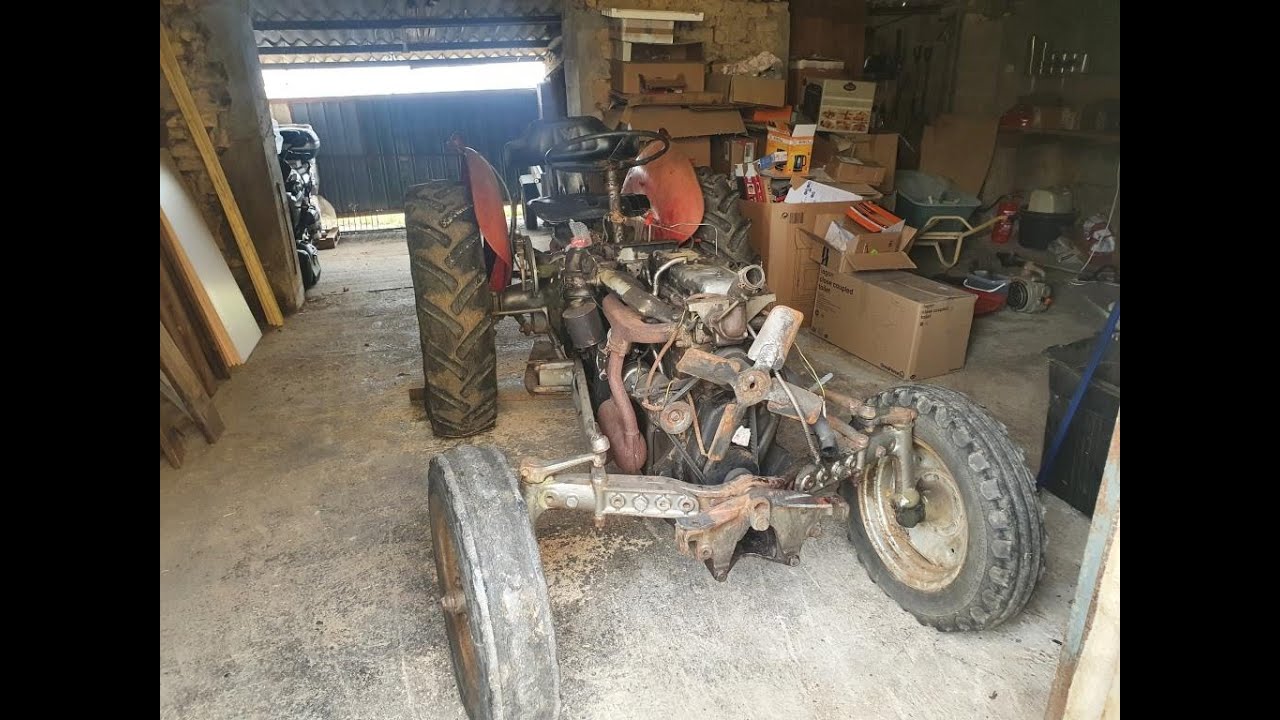 Снятие тормозного барабана Massey Ferguson 35 или 835 DET, проверка состояния тормозов, снятие оси