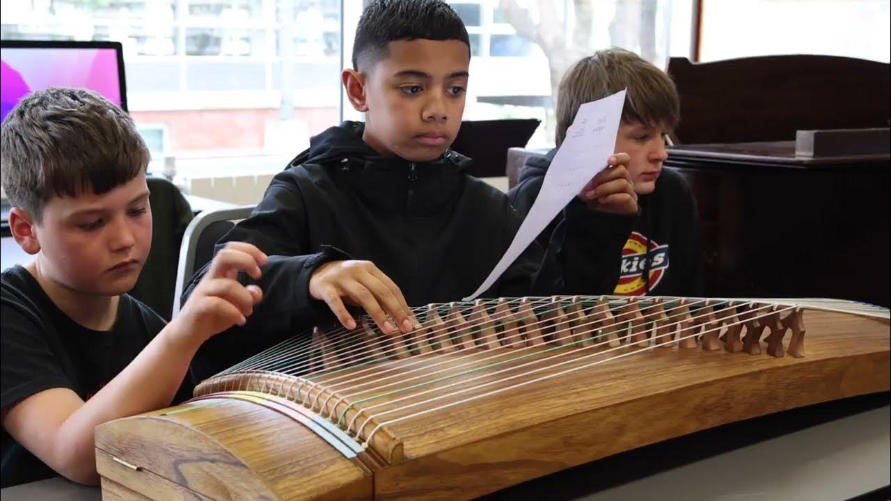 Cultural center gives class on guzheng to students in Wellington YouTube