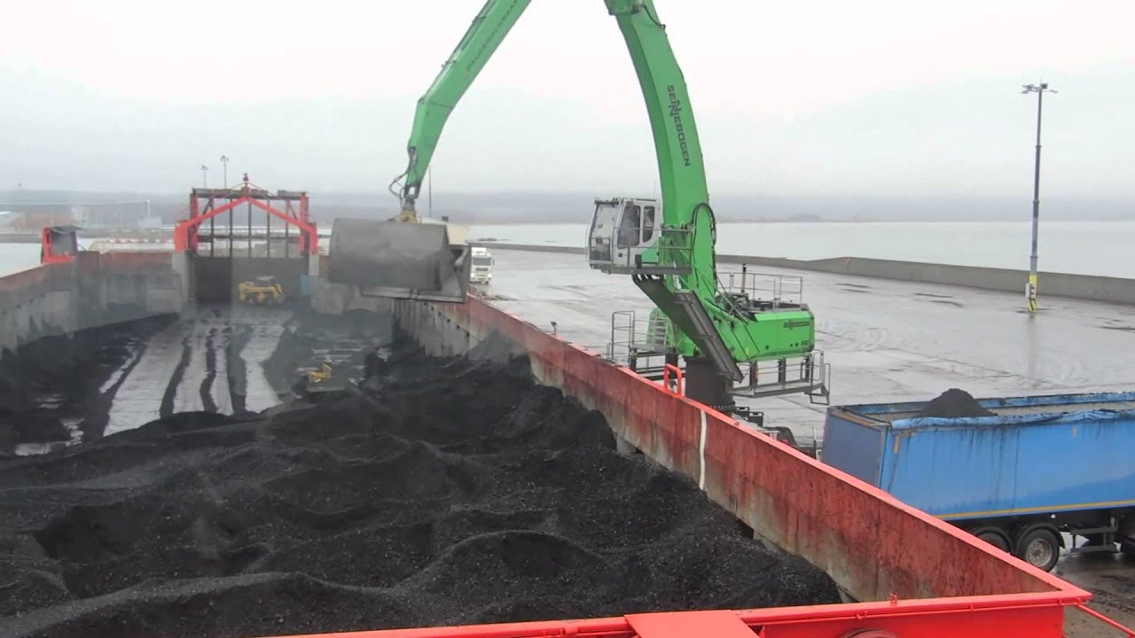 Sennebogen 860 with Exstel EXB-SCHL 5.0 m3 - YouTube