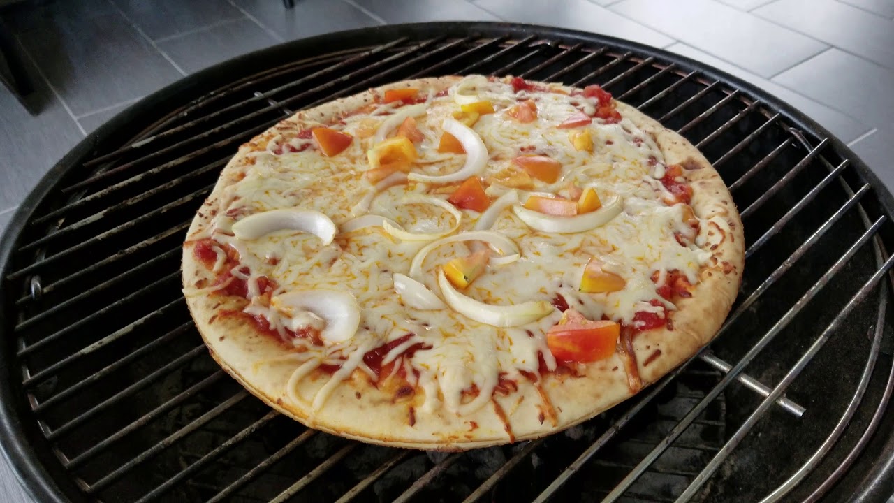 Making pizza on the charcoal BBQ grill! YouTube