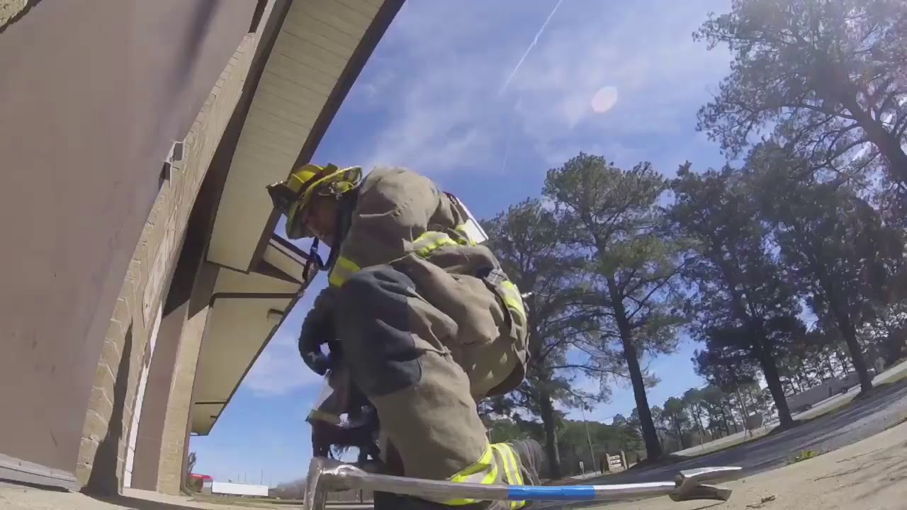 SCBA Masking up at the door drill.