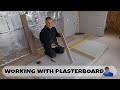 Drylining working with plasterboard