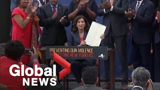 New York governor signs 10 gun bills into law, including raising age to buy semi-automatic weapons