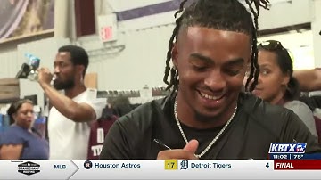 Texas A&M football players spend the day at C.C. Creations giving back to fans